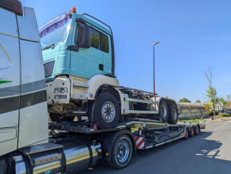 MAN hooklift truck departed for Spain